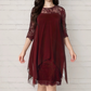 Elegante jurk met hoge en lage zoom en kanten overlay voor dames