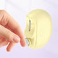 Elektrische nagelknipper met opvangbak voor nagelrestjes.