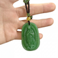 Ketting met kralen en hanger van religieuze figuur
