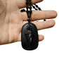Ketting met kralen en hanger van religieuze figuur